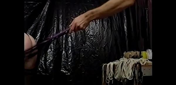  Maledom ties up skinny brunette puma with ropes and nipple clips in his lair